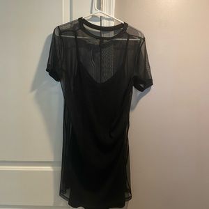 Black slip on dress with mesh cover up attached! Size: M